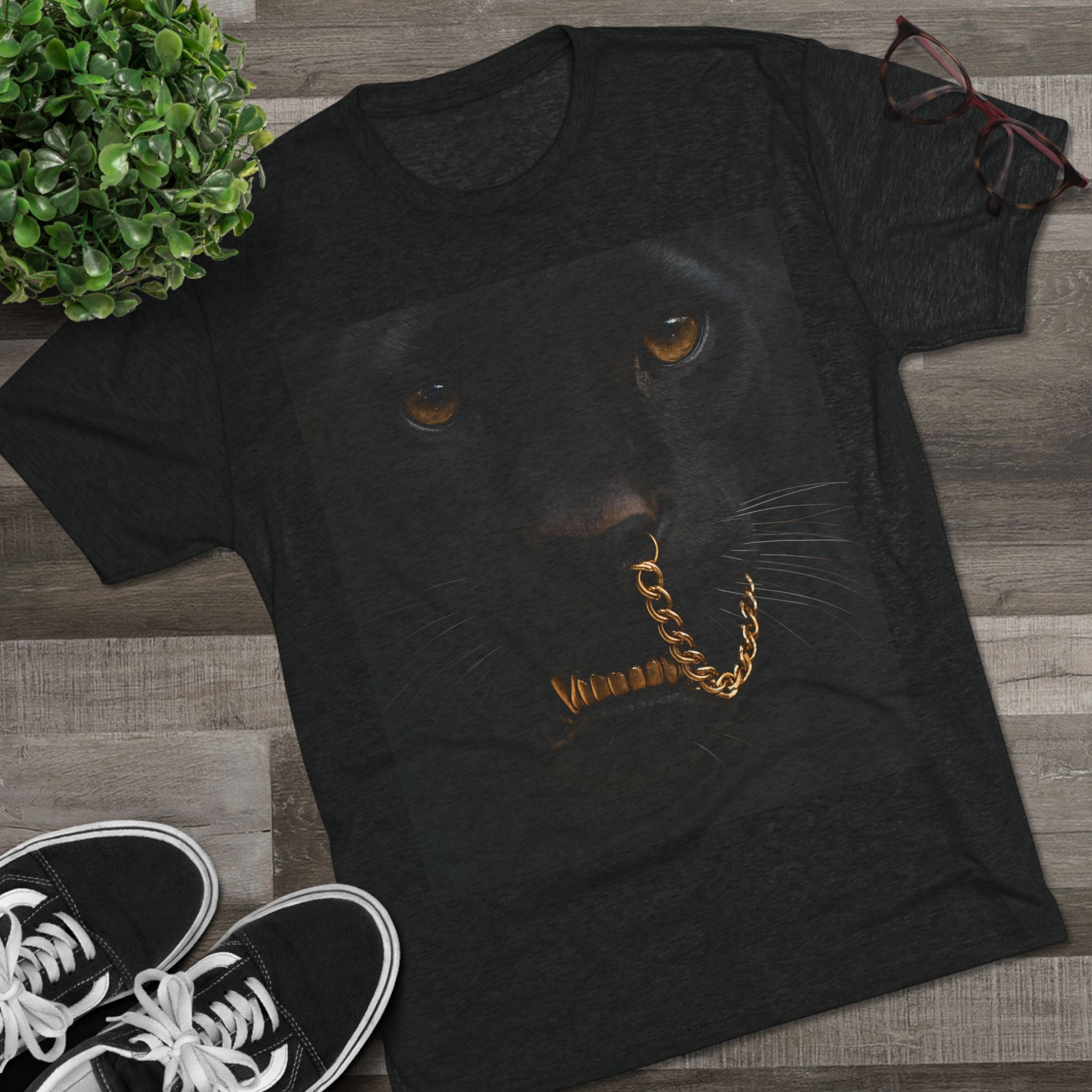 Close-up of black panther eyes with a gold "Warrior" chain, symbolizing strength, healing, empowerment, and silent power.